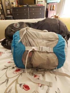 Backpack behind it for size comparison.